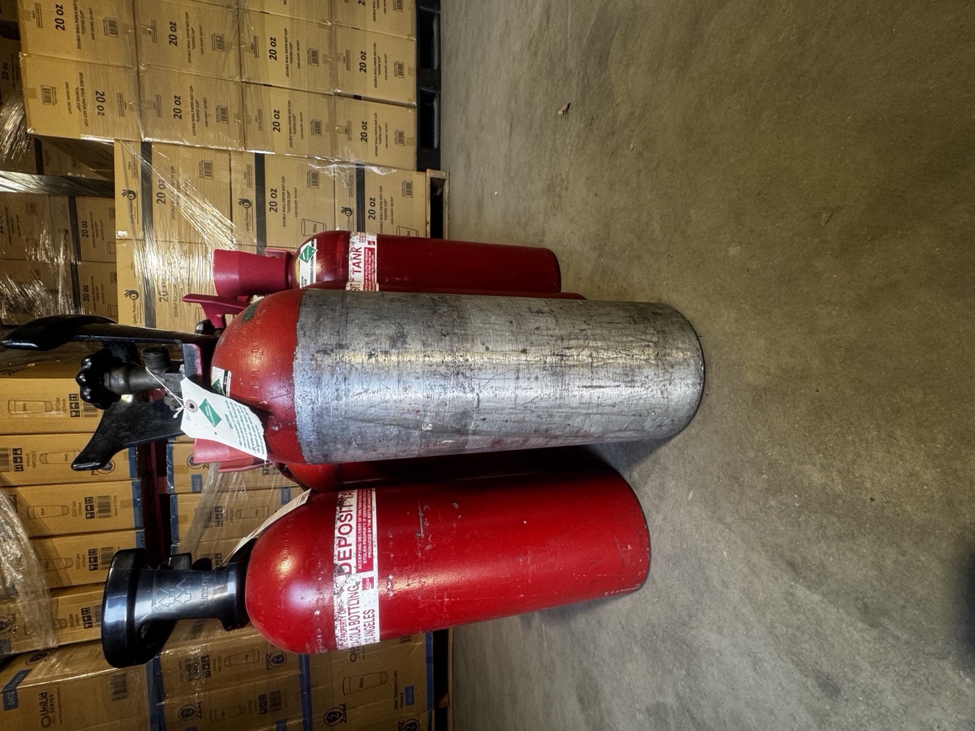 CO2 deposit tanks lined up in the Quality Beverage warehouse in Fresno